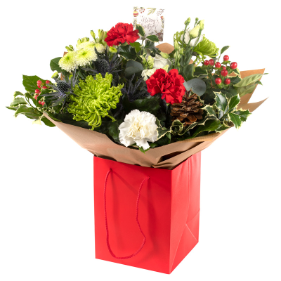 Festive handtied - A festive hand-tied filled with seasonal flowers, perfectly wrapped by the florist and delivered in a gift box/bag, in water.